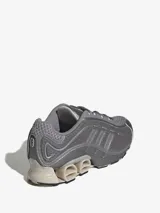 Zapatillas Adidas Megaride 01 color gris con detalles plateados.