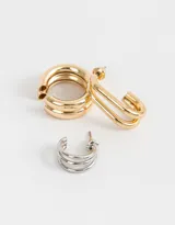 Set de tres aros de metal: dos argollas con cierre a presión, una dorada y otra plateada, y un earcuff dorado chunky.