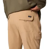 Pantalón de senderismo color beige, de corte recto, con múltiples bolsillos con cierre de velcro y orificios de drenaje.