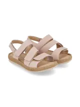 Sandalias de cuero nobuck color rosa pálido, con múltiples tiras ajustables con velcro, plantilla de cuero acolchada y suela de PVC cosida y flexible.