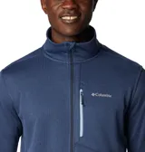 Campera polar Columbia Park View Fleece, color azul jaspeado, con cierre frontal completo, cuello alto, bolsillos laterales con cierre y bolsillo en el pecho con cierre vertical en color verde lima. Cuenta con tecnología Omni-Wick, puños elásticos con orificios para pulgares y protector de barbilla.