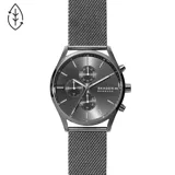 Reloj Skagen con caja de acero inoxidable gris oscuro de 42mm y malla metálica a juego. Cuenta con mecanismo de cuarzo con cronógrafo, esfera gris oscuro sunray con índices plateados y cristal mineral resistente. Resistente al agua hasta 3 ATM.
