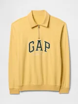 Buzo deportivo amarillo con cuello polo y medio cierre, con logo GAP Athletic estampado en verde y blanco.