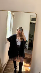 Ruana tejida artesanalmente en lana y algodón.