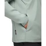 Buzo deportivo Under Armour Drive Pro, color verde agua, con cierre parcial frontal, cuello alto y logo en el pecho.