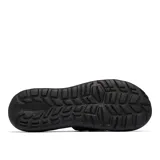 Sandalia tipo slide para hombre, color negro, con una banda ancha ajustable mediante hebilla y cierre de velcro. Presenta un diseño robusto con mediasuela acolchada y suela con tracción Omni-GRIP™ LT.