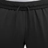 Pantalón largo de fútbol Nike Dri-Fit Strike para hombre, color negro con logo verde neón y detalles en verde neón en la parte inferior de las piernas.