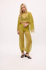 Poncho de gasa color celeste, de talle único.