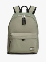 Mochila de nailon color verde oliva, con diseño liso y paneles texturizados. Presenta un compartimento principal con doble cremallera, un bolsillo frontal con cremallera y un parche con el logo de Tommy Jeans en la parte inferior. Las correas y el asa superior son negras.