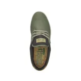 Zapatillas deportivas de lona negro con detalles en color mostaza y suela blanca.
