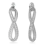 Aros colgantes Swarovski de la colección Hyperbola, con forma de símbolo de infinito, elaborados en metal con baño de rodio y cristales blancos engarzados. Cierre de clip.