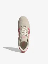 Championes Adidas Taekwondo Lace color crema con las tres tiras laterales en rosa.
