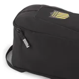 Bolso botinero Puma del Club Atlético Peñarol, color negro con detalles en amarillo. Presenta el escudo del club y el logo de Puma estampados.
