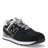 Championes New Balance modelo 574, color negro con detalles en gris y blanco, confeccionados en gamuza y malla, con logo "N" característico en los laterales y entresuela ENCAP.