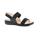 Sandalias bajas negras con dos tiras elásticas sobre el empeine y ajuste con velcro en el tobillo.