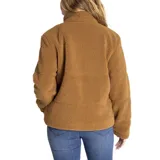 Chaqueta polar de mujer color negro, con cuello alto y cierre frontal con broches ocultos. Tiene bolsillos laterales y un bolsillo interior en el pecho. Presenta logo de Caterpillar en el bolsillo.