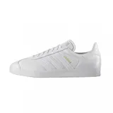 Championes Adidas Gazelle de cuero blanco con las tres tiras laterales y el logo en dorado.