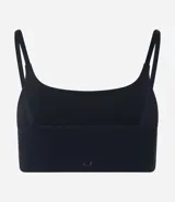 Top deportivo femenino Get Over, color verde militar, confeccionado en poliamida y elastano, con breteles finos y sin estampa.