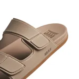 Sandalias Reef color beige con dos tiras ajustables con velcro y logo de la marca en el lateral.