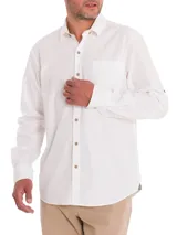 Camisa blanca de manga larga para hombre, confeccionada en algodón orgánico. Cuenta con cuello camisero, cierre con botones de madera, bolsillo en el pecho y mangas ajustables con botones.