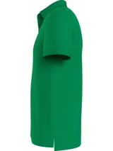 Chomba verde de corte slim, con cuello polo, tapeta de dos botones y logo de Tommy Hilfiger bordado en el pecho.