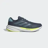 Championes de running Adidas Supernova Stride 2 en color azul marino con detalles en celeste y verde neón. Presentan un exterior de malla textil y sintética para mayor transpirabilidad, mediasuela Dreamstrike+ que ofrece una amortiguación dinámica y suela Adiwear para un agarre duradero.