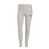 Calza gris de algodón con tres tiras negras laterales y logo Adidas estampado en la pierna izquierda.