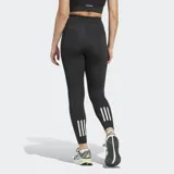 Calza deportiva Adidas de running, color negro, con cintura alta, largo 7/8 y logo de la marca en la pierna izquierda.