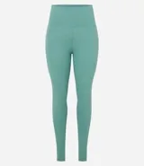 Calza legging deportiva color verde agua, de microfibra, con cintura ancha y bolsillos laterales.