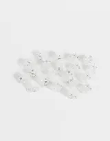 Set de 20 minibroches negros para el cabello, presentados en una bolsita plástica transparente con cierre y cadena metálica.