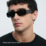 Lentes de sol estilo rectangular en color negro, con protección UV400 y lentes polarizadas.