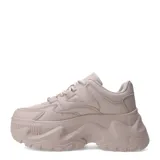 Zapatillas deportivas color beige con plataforma gruesa y acordonadas.