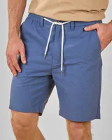 Bermuda de lino y algodón a rayas verticales en tonos beige, marrón y blanco, con cintura elástica ajustable con cordón.