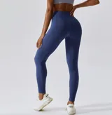 Calza deportiva azul con cintura alta y diseño texturizado.