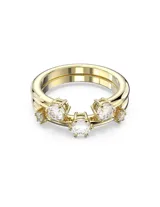 Conjunto de dos anillos Swarovski color dorado con cristales blancos redondos engarzados.
