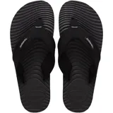 Ojotas Havaianas Surfer Coast color negro con base texturizada y tiras de tela con el logo de la marca.