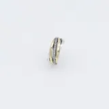 Anillo de plata con detalles en oro y circonias.