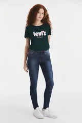 Jeans skinny de tiro alto, color azul oscuro con lavado medio.