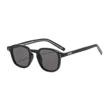 Lentes de sol unisex de plástico reciclado color negro, con filtro UV 400.
