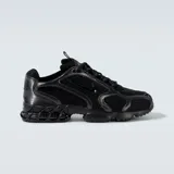 Championes Nike Air Zoom Spiridon Cage 2, color negro, con capellada de malla y detalles de cuero sintético.