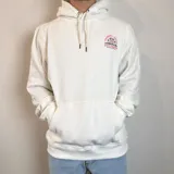 Canguro blanco con capucha y cordones ajustables, puños y cintura acanalados. Estampado en la espalda con un sol, olas y la frase "Chasing the waves Santa Barbara".