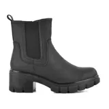 Botas Chelsea color marrón con elástico lateral, caña baja y suela track con taco ancho.
