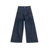 Pantalón jean azul oscuro, corte ultra baggy, tiro alto y diseño con costuras a la vista.