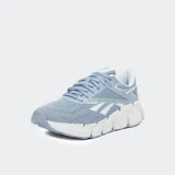 Championes Reebok Zig Dynamica 6 color celeste con detalles en blanco.