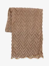 Chal de poliéster con diseño de zigzag en tonos marrones.