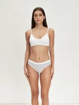 Pack de tres colaless de algodón en color gris con cintura elástica blanca.