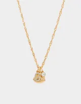 Cadena dorada con dije de strass y corazón de metal.