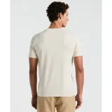Remera color crema de algodón orgánico, con cuello redondo, mangas cortas y logo de pingüino bordado en el pecho.