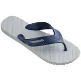 Ojotas Havaianas modelo Track Waves, color blanco con textura geométrica en la plantilla y logo de la marca en la tira.