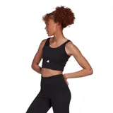 Top deportivo Adidas negro, de corte cropped y tejido acanalado.